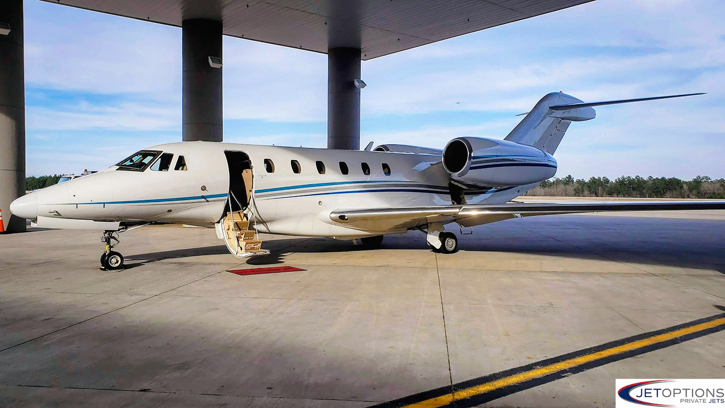 JetOptions private jet charter on the ground at Conroe North Houston Airport